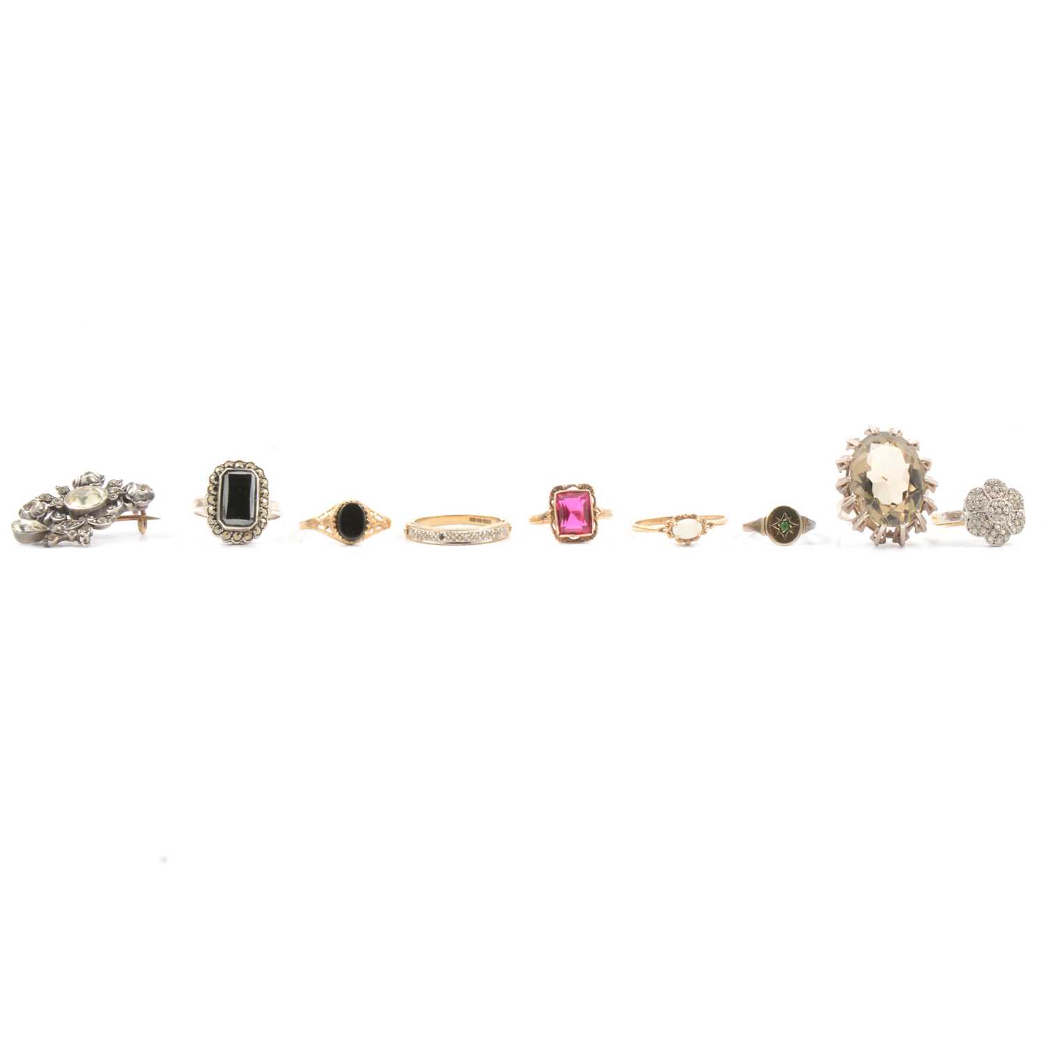 Lot 56 - Eight silver and gold rings, paste set brooch