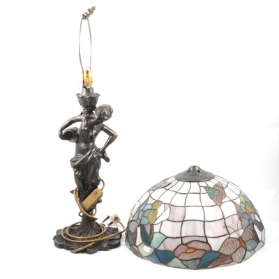 Lot 116 - Art Nouveau style figural lamp base with leaded glass shade