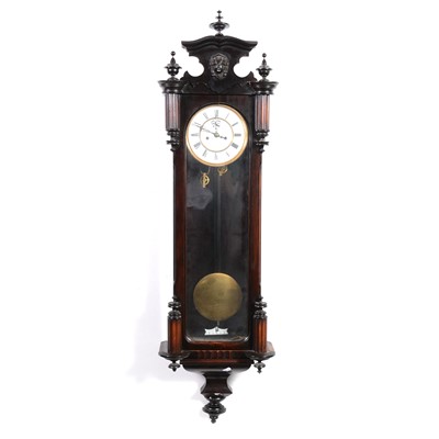 Lot 445 - Vienna type stained walnut wall clock