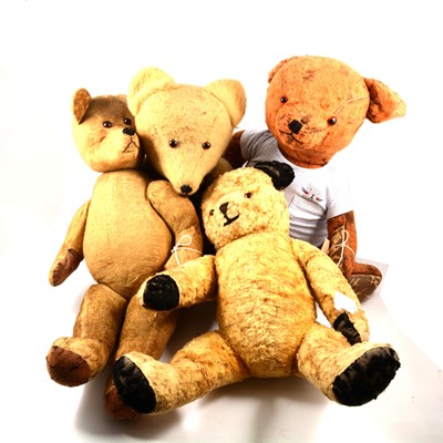 Lot 232 - Four large mid-century straw filled teddy bears