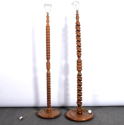 Lot 422 - Two Welsh Arts & Crafts oak standard lamps