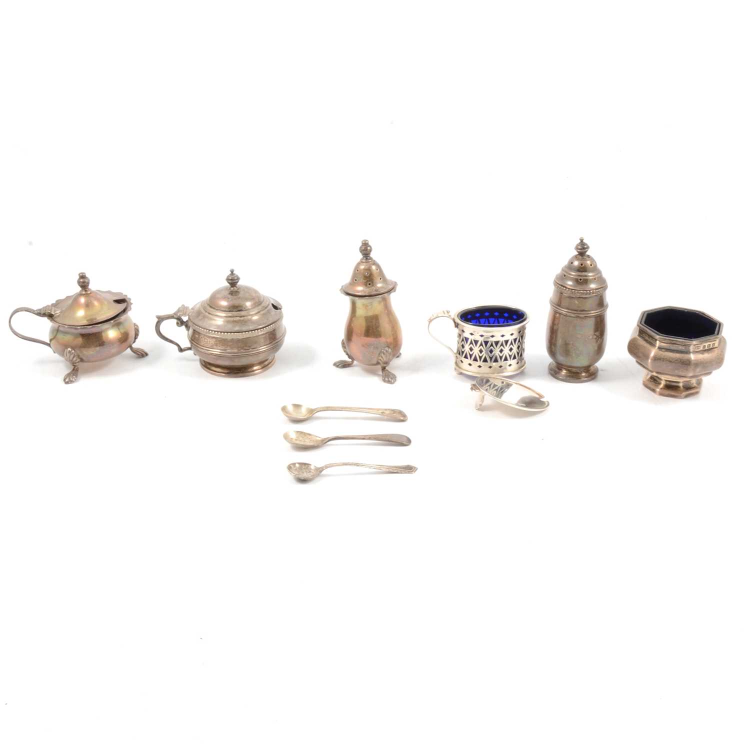 Lot 136 - Silver mustard pot and pepperette, Adie Brothers, Birmingham 1928, and other silver condiments.