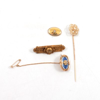 Lot 340 - An Etruscan style bar brooch, enamel pin set with a diamond, seed pearl stick pin, cufflink face.