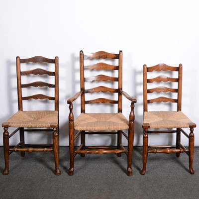 Lot 412 - A harlequin set of eight ladder-back dining chairs