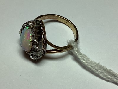 Lot 40 - An opal and diamond dress ring and coronet from a brooch.