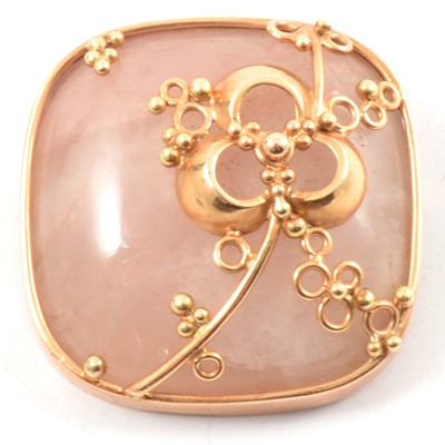 Lot 145 - A rose quartz brooch.