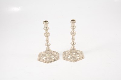 Lot 63 - Pair of George III silver taper candlesticks, possibly Ebenezer Coker, London 1765