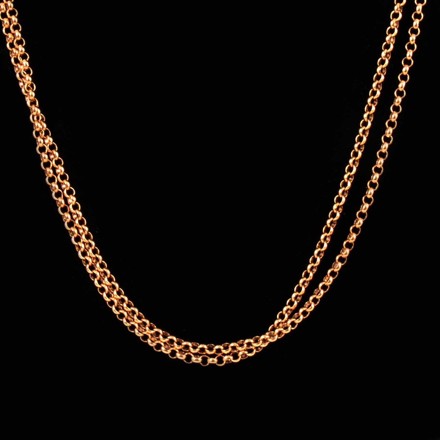 Lot 109 - A modern 9 carat rose gold Victorian style guard chain.