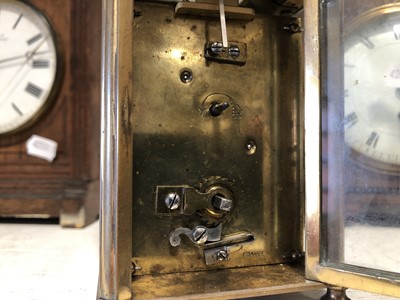 Lot 73 - Small brass carriage clock and two oak cased clocks