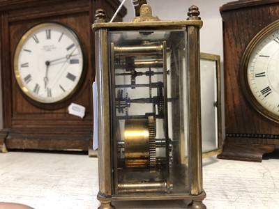 Lot 73 - Small brass carriage clock and two oak cased clocks