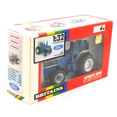 Lot 247 - Britains Farm toy, ref 9508 Ford TW 25 tractor, boxed.