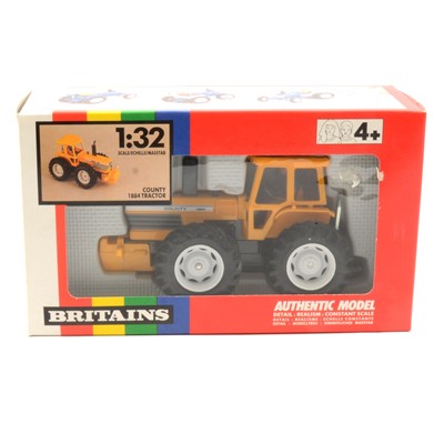 Lot 236 - Britains Farm toy, ref 9521 county 1884 tractor, orange/yellow body, boxed.