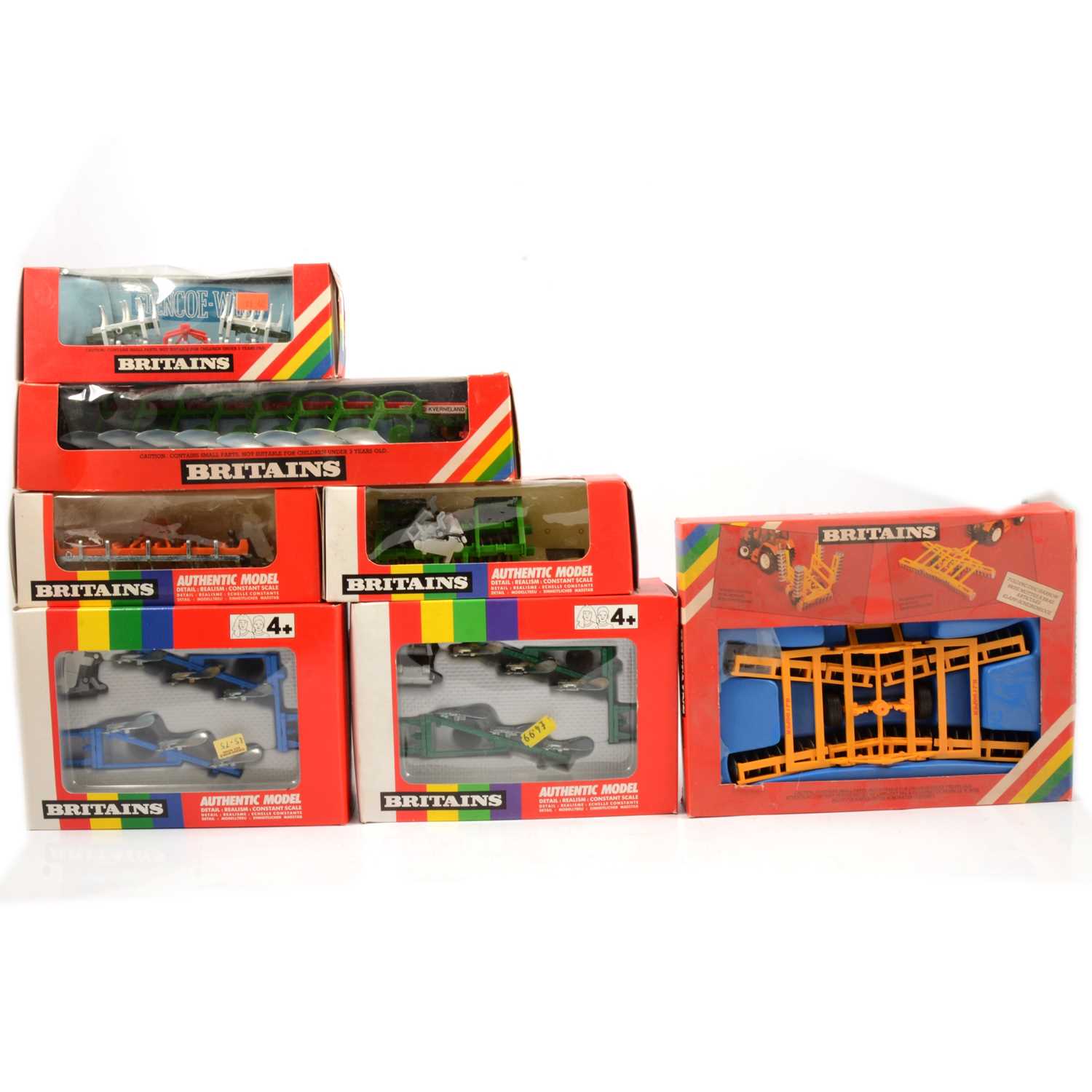 Lot 243 - Britains Farm toys, seven attachments