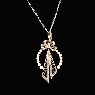 Lot 119 - An Edwardian diamond and pearl pendant and chain.