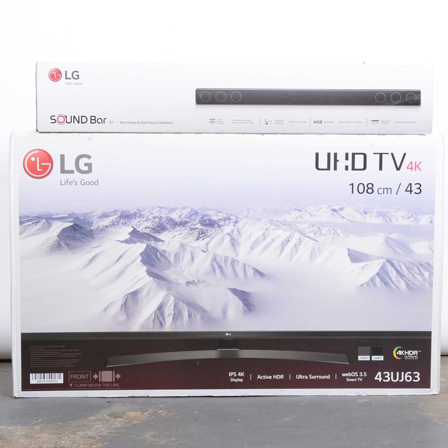 Lot 245 - A LG 43 inch 4K TV, and an LG soundbar.