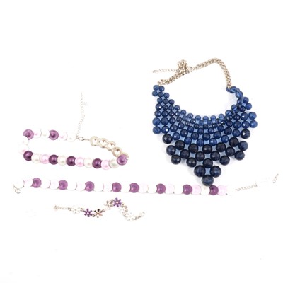 Lot 247 - New costume jewellery in purple, lilac and blue tones.