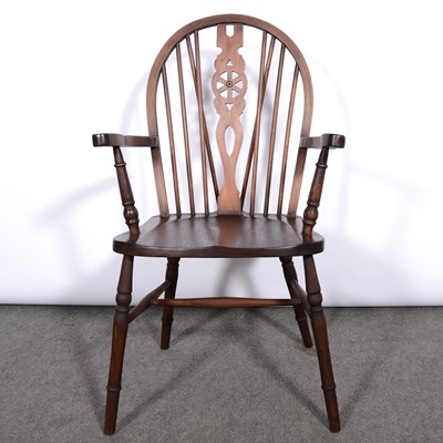 Lot 412 - Stained beech and hardwood wheelback Windsor chair