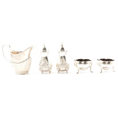 Lot 145 - A Victorian silver cream jug, Charles Stuart Harris, London 1888, and other small silver items.