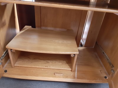 Lot 380 - Ercol compact computer cupboard