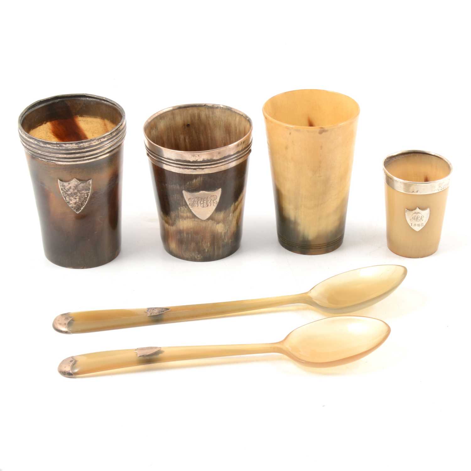 Lot 214 Four horn beakers, two spoons.