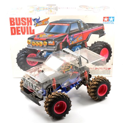 Lot 319 - Tamiya 1:10 scale off-road pick-up 'Bush Devil', 'Midnight Pumpkin' and Mini Outlaw.