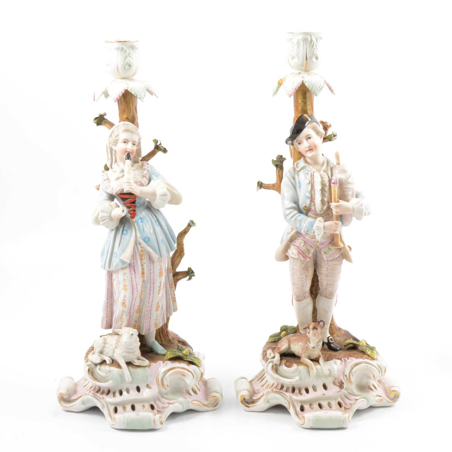 Lot 28 - Pair of Meissen style figural candlesticks