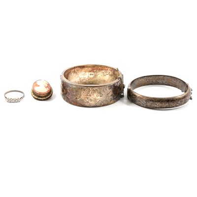 Lot 225 - Two silver half hinged bangles, silver five stone ring and cameo brooch.