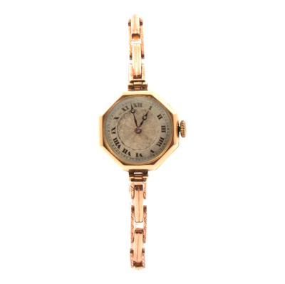 Lot 344 - Bravingtons - a lady's 9 carat yellow gold bracelet watch with box and guarantee.