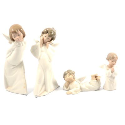 Lot 12 - Four Lladro angel figurines.