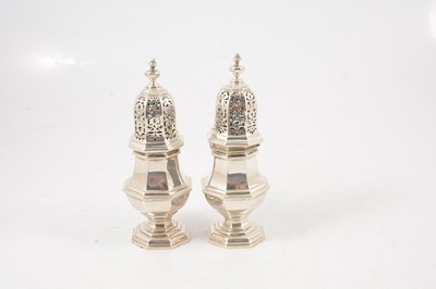 Lot 88 - Pair of Queen Anne style silver baluster-shape casters, Crichton Brothers, Britannia standard, 1906
