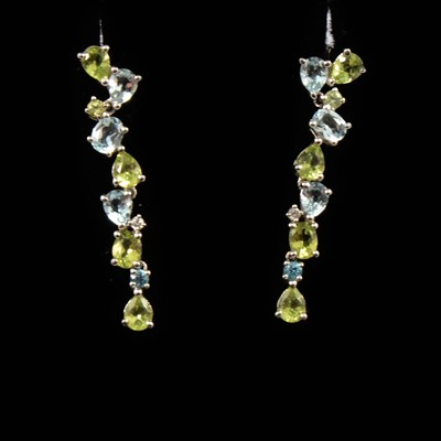 Lot 167 - A pair of aquamarine and peridot drop earrings, new and boxed.