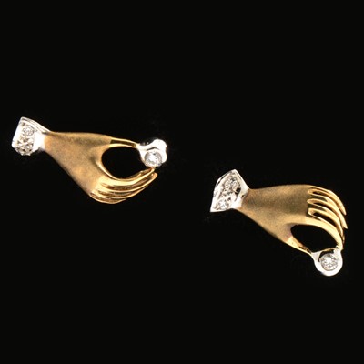 Lot 192 - A pair of 9 carat yellow gold hand design earrings, new.