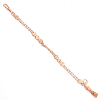 Lot 97 - A rose metal albertine bracelet with tassel.