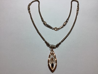 Lot 114 - Two gold necklaces, a pendant and metal guard chain.
