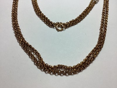 Lot 114 - Two gold necklaces, a pendant and metal guard chain.
