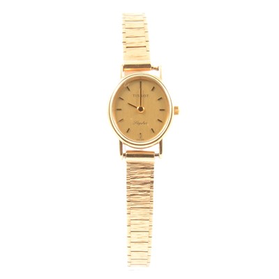 Lot 265 - Tissot - a lady's Saphir 9 carat yellow gold bracelet watch.