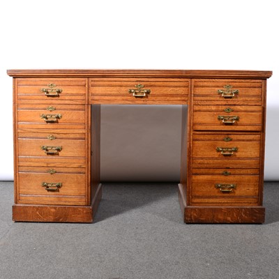 Lot 315 - Edwardian oak desk