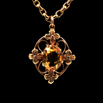 Lot 170 - A citrine pendant and chain.