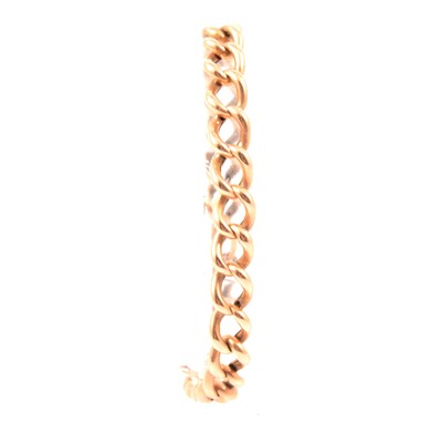 Lot 132 - A rose metal hollow curb link bracelet.