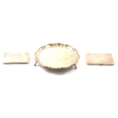 Lot 148 - Small silver salver, Robert Pringle & Sons, London 1923, and two silver cigarette cases.