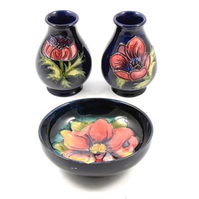 Lot 7 - Moorcroft Pottery pair of Anemone pattern vases, and a Clematis pattern bowl.