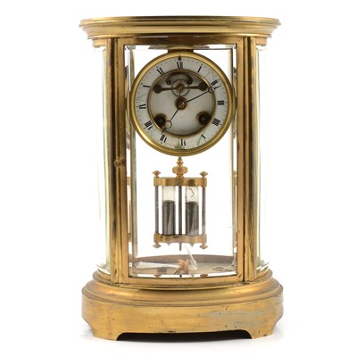Lot 202 - French oval four glass mantel clock
