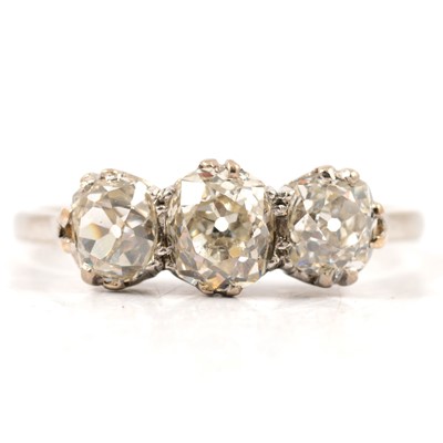 Lot 1 - A diamond three stone ring.