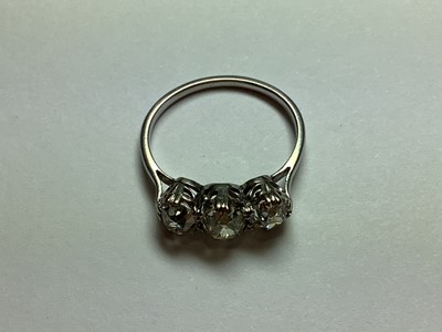 Lot 1 - A diamond three stone ring.