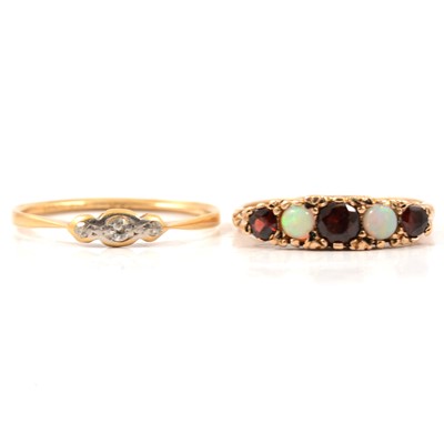 Lot 32 - A reproduction opal and garnet ring, a worn diamond illusion set ring
