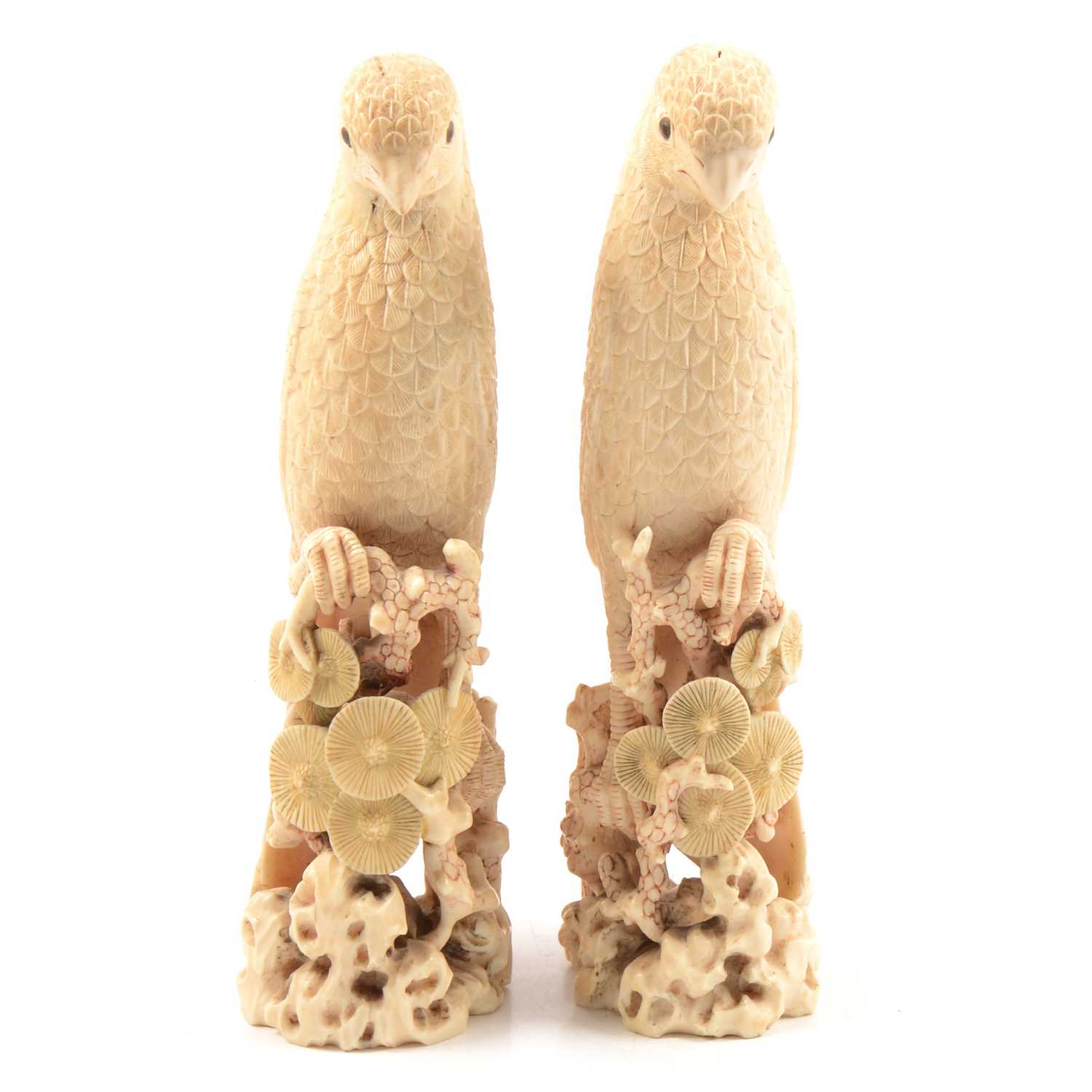 Lot 122 - Pair of Japanese carved ivory parrots, Meiji period
