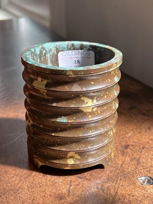 Lot 85 - Chinese bronze and gold splashed brush pot
