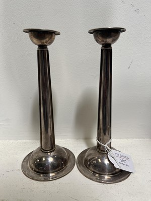 Lot 1107 - Martyn Pugh, a pair of Modernist silver candlesticks, George Pragnell Ltd, Birmingham 2000