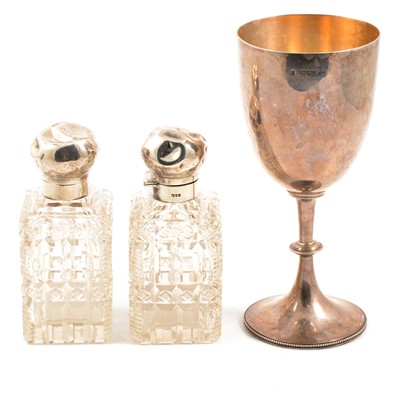 Lot 242 - Victorian silver chalice, John Aldwinckle & Thomas Slater, and two silver-mounted cut glass bottles.