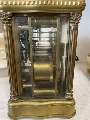 Lot 179 - French brass serpentine cased carriage clock
